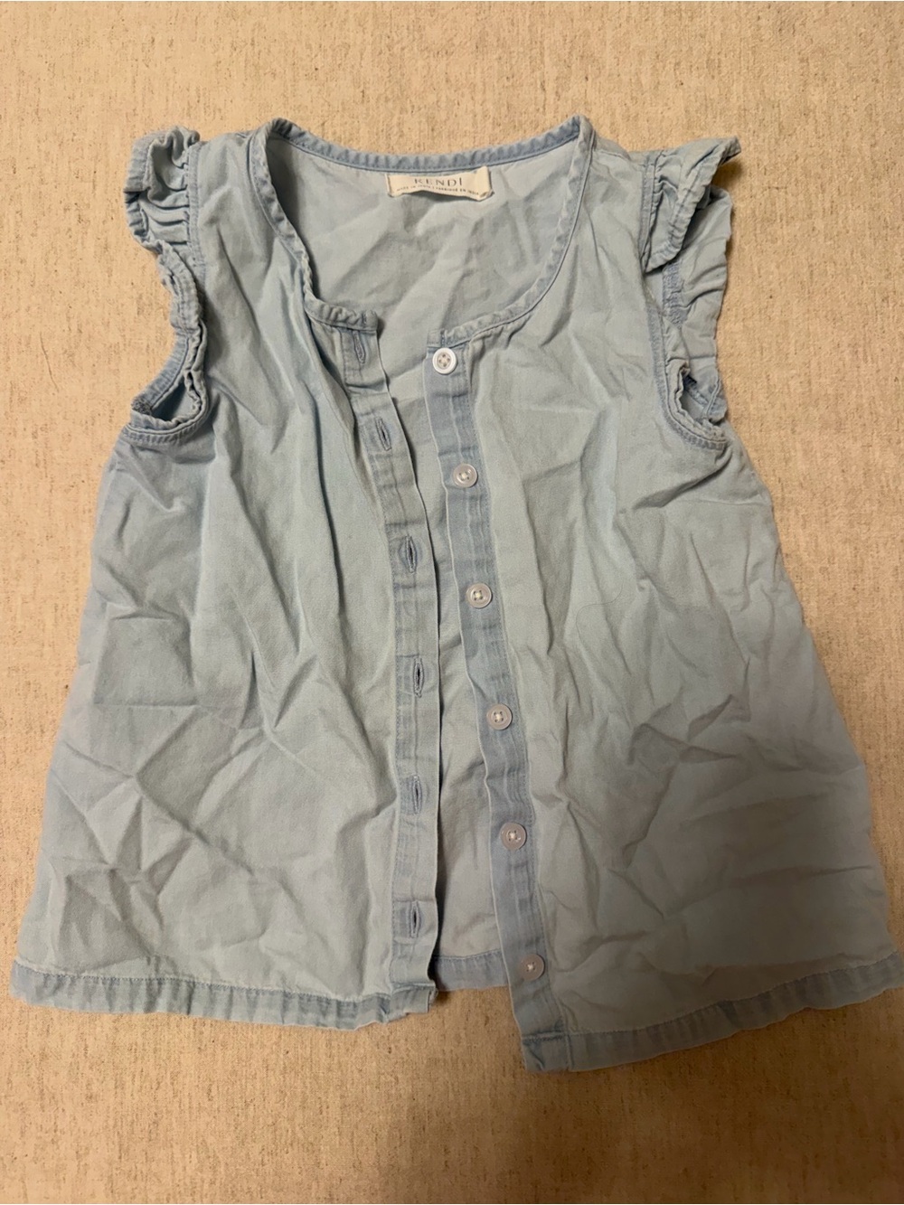 Kendi Chambray Sleeveless Ruffle-Trim Button Front Top